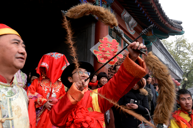 The Groom and the Bridal Bullseye | Getty Images Photo by MARK RALSTON/AFP